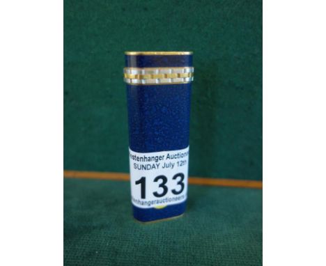 Cartier Paris, a navy blue gilt metal gas lighter 2.5" tall signed Cartier Paris to base, and numbered 50276 You can now bid 