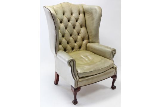 A Victorian Style Pale Green Leather Brass Studed Wing Back Armchair With Buttoned Back Loose