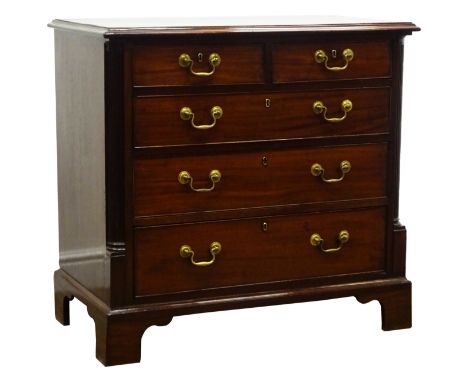 Small George III mahogany chest with moulded top above two short and three long cockbeaded drawers enclosed by fluted quarter