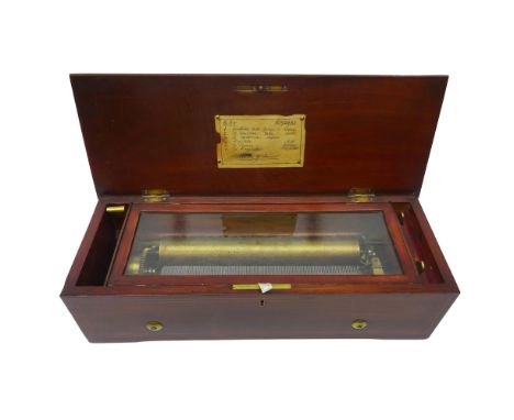 19th century Nicole Freres musical box, the hinged rosewood top inlaid with musical trophies and flowers, opening to reveal a