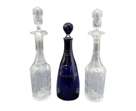 19th century Bristol Blue glass decanter with lozenge shaped stopper, labelled in gilt 'Brandy' with trailing grape vines H31