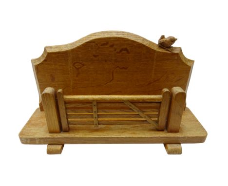 'Wrenman' oak letter rack, with five bar gate, the shaped back with carved wren signature, on sledge supports, by Robert Hunt
