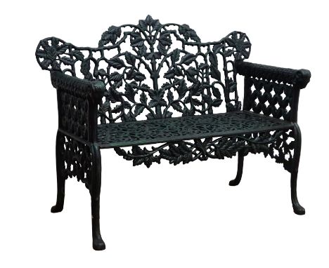 Victorian style cast iron garden bench, with ornate leaf back and lattice arms on scroll feet, H88cm, W100cm Condition Report
