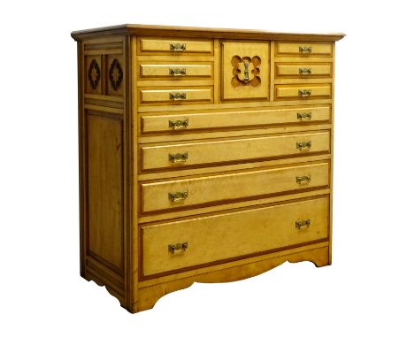 Aesthetic Movement birds eye maple chest of six short, one deep and four long drawers with angular brass handles, with crossb