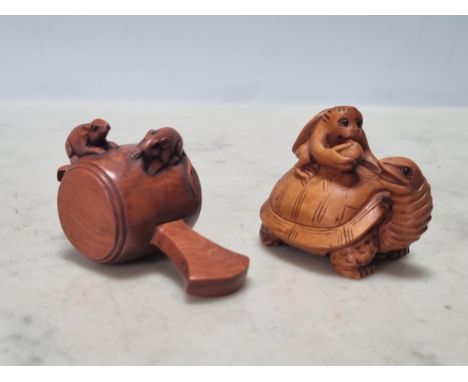 Two carved wood Netsuke in the form of turtles and mice on a barrel