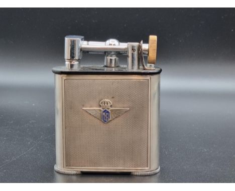 An Art Deco, KLM Dutch Airlines 935 silver Jumbo lift arm Table Lighter, commemorating the 1935 flight from Curacao to Venezu