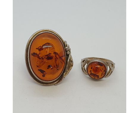 Two Amber-set Silver Rings, no hallmarks, both ring size K, 12.5gms