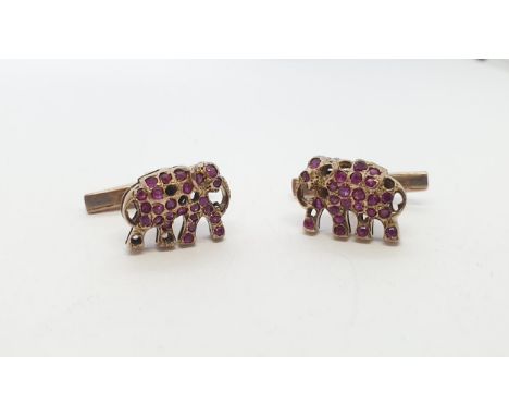 A pair of Ruby Elephant Cufflinks each set numerous round stones, stones deficient, approx 9gms