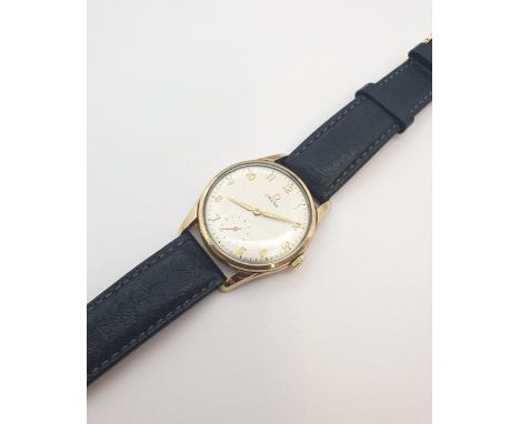 A gentleman's manual wind Omega Wristwatch model number 267, the champagne dial with arabic numerals and subsidiary seconds d