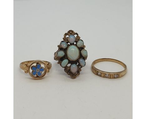 A collection of three Rings, one 9ct gold ring set with white stones (ring size Q), one 9ct gold ring set with central blue e