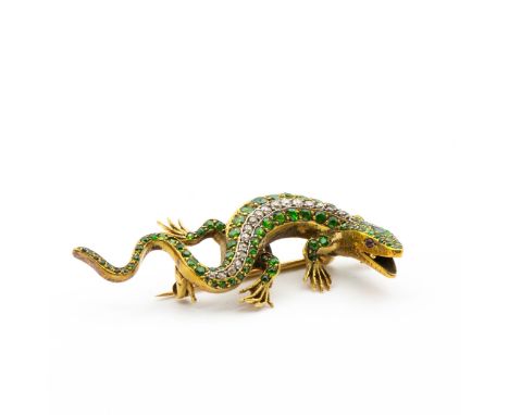 A French gem-set Salamander Brooch with ruby eyes, a row of graduated old-cut diamonds pavé-set to back between rows of green