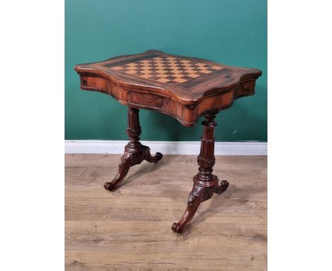 A William IV rosewood Games Table having serpentine sides with inlaid chessboard top, chequered and satinwood stringing,  abo