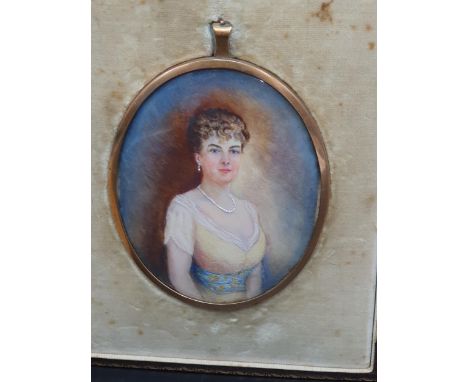 An oval Miniature: half length painted Portrait of young lady wearing necklace, in gilt metal frame, approx 3in x 3 3/4in in 