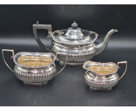 An Edward VII silver three piece Tea Service of boat shape with gadroon embossing, Chester 1902/3, 1120gms all in