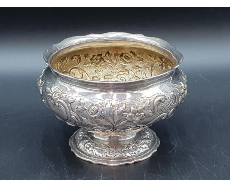 A Victorian silver Sugar Bowl with floral and leafage scroll embossing, engraved Somerset crest with portcullis and ducal cor