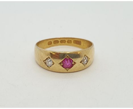 An early 20th century Diamond &amp; Ruby Ring, gypsy set cushion-cut ruby between old-cut diamonds in 18ct gold, ring size L 