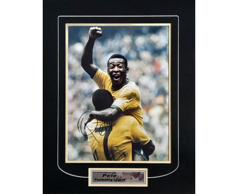 PELE AUTOGRAPHED &amp; MOUNTED PHOTO
Pele signed and mounted Brazil 1970 World Cup winners photo, shown here celebrating with