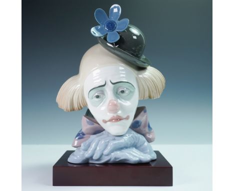 A captivating Lladro porcelain sculpture titled Pensive Clown, model 1005130, designed by Jose Puche and issued in 1982. This