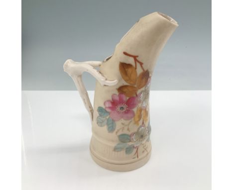 Antique Victoria Carlsbad Austria porcelain ewer featuring an elegantly curved spout and handle with hand-painted floral moti