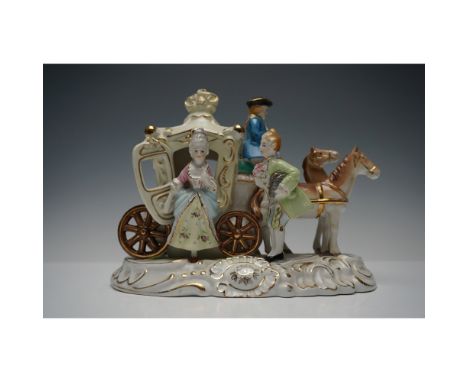 This finely crafted piece showcases a detailed carriage with intricate bas-relief patterns and gold accents, pulled by two ho