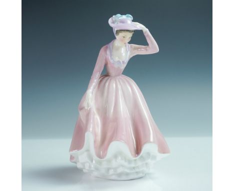 A charming Royal Doulton figurine titled Sweet April, model number HN2215. This elegant porcelain piece depicts a young woman
