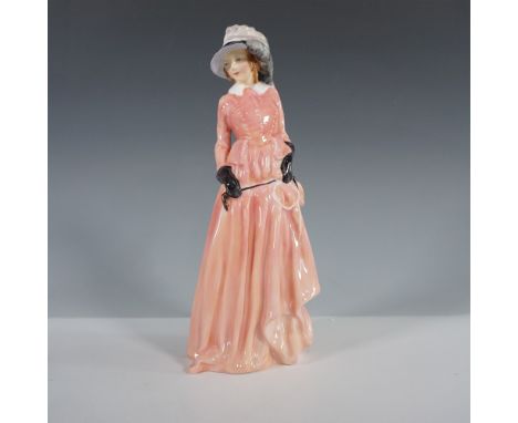 Graceful and poised, this Royal Doulton figurine, Maureen (HN 1770), captures the elegance of a bygone era. Designed by Lesli