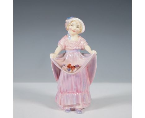 Delightful Royal Doulton figurine Lucy Ann HN1502, depicting a young girl in a flowing pink dress, gracefully holding the edg