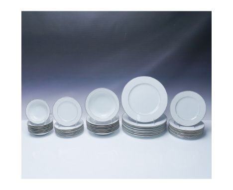Crown Empire fine china tableware set in the Princess pattern, featuring white floral and fleur-de-lis decorations with metal