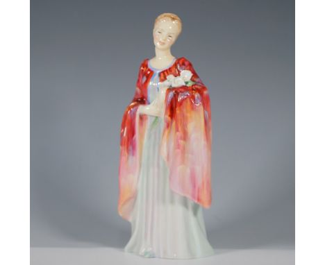 Part of the esteemed Harradine Classics series, his figurine captures a poised young woman in a flowing pastel green gown, ac