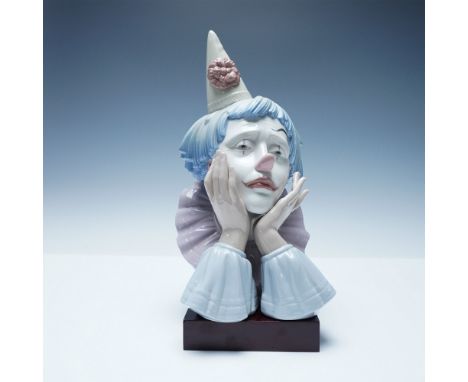 Delightful Lladro porcelain bust titled Jester, model number 1005129. This beautifully sculpted piece captures the wistful ex