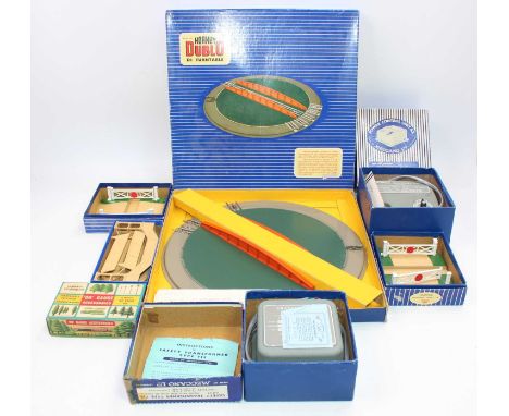 Hornby Dublo items: Turntable (M-BE), with larger illustration; T15 controller (E-BG); A2 controller, missing overload indica