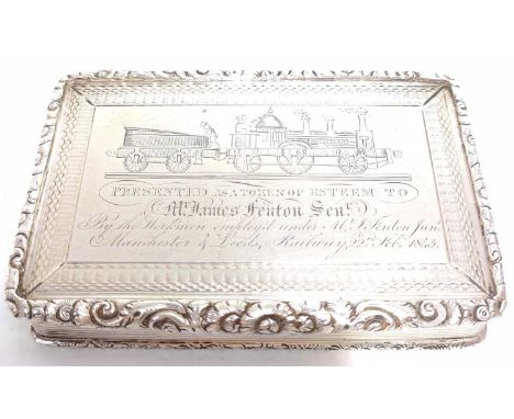 Railway interest: An early Victorian silver-gilt presentation table box, of engine turned rectangular form, the hinged lid be