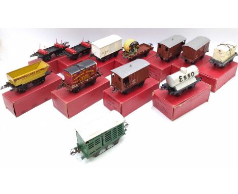Eleven post-war Hornby wagons all boxed: Esso silver tank, NE refrigerator, LMS goods, 2 x LMS goods brakes, Trinidad Lake As