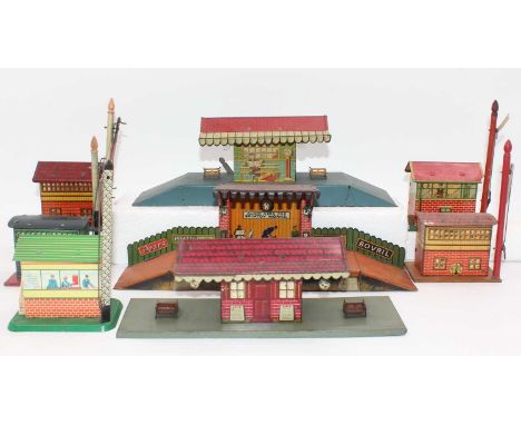 A large tray containing 3x Brimtoy stations including Model Wayside No. 53, electric Country No. S/1E and Country No. S1, wit