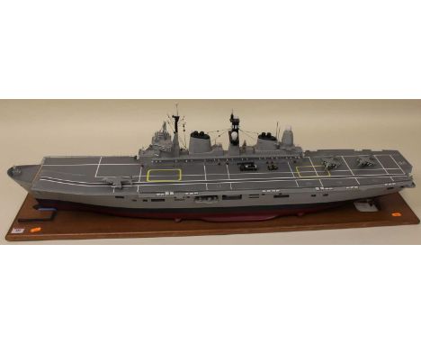 A very well made wooden and plywood 1/16th inch to 1 ft, Radio Controlled model of the 1985 HMS Ark Royal, built from G.L.Y H