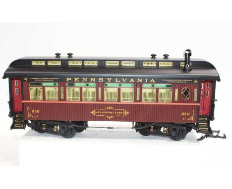 Three Bachmann Spectrum G scale coaches Pennsylvania, deep maroon and black, with balcony ends. Two 969 and one baggage car 2