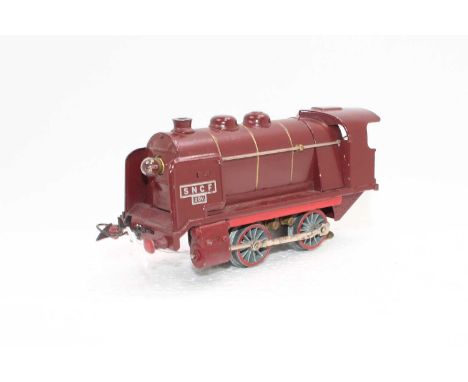 Two French Hornby SNCF 0-4-0 steam outline O-E locos, 20v ac each without its tender: post-war red with bright red weights, w