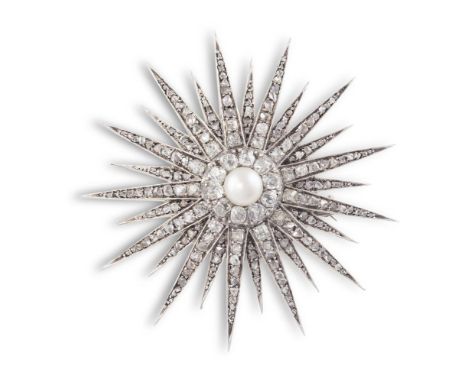 A DIAMOND AND PEARL STAR BROOCH, CIRCA 1890The multi-rayed star set throughout with old cushion and rose-cut diamond highligh