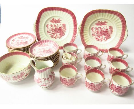 A Staffordshire late 19thC porcelain fluted tea service, transfer decorated in red and white in the Willow pattern, comprisin