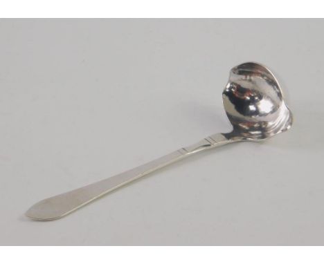 A Georg Jensen Continental pattern silver cream ladle, early 20thC import marks, London, 0.92oz.
