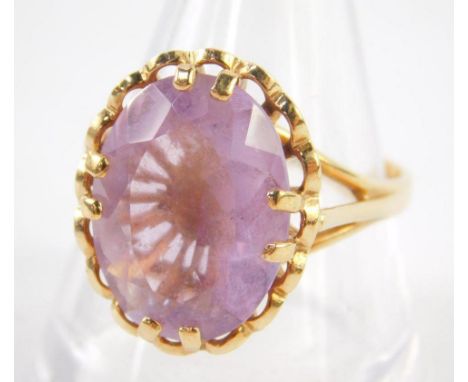 A 9ct gold and oval cut amethyst ring, size Q, 4.5g.