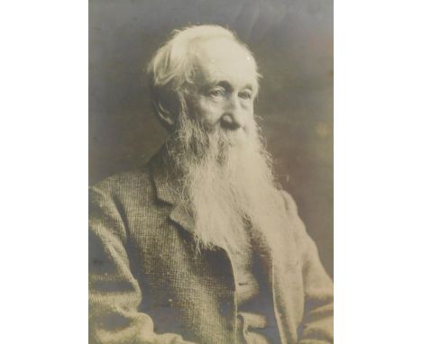 A 19thC photographic portrait, of an old gentleman with grey beard, in a heavy stained pine frame, 33cm x 27cm