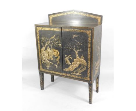 A 19thC black Japanned side cabinet, decorated overall in oriental style with flowers, leaves and with raised decoration of f