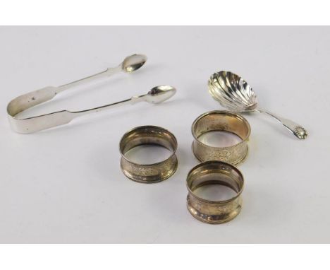Various George III silver, comprising feather shaped caddy spoon, 9cm wide, three various napkin rings, a pair of sugar bows,