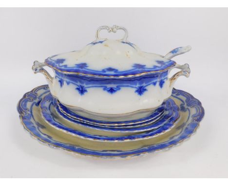 A Grindley late 19thC flow blue and white pottery part dinner service, decorated in the Derwent pattern, comprising seven mea