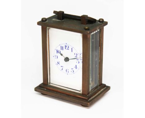 An early 20th century miniature brass carriage clock, height 8cm.  