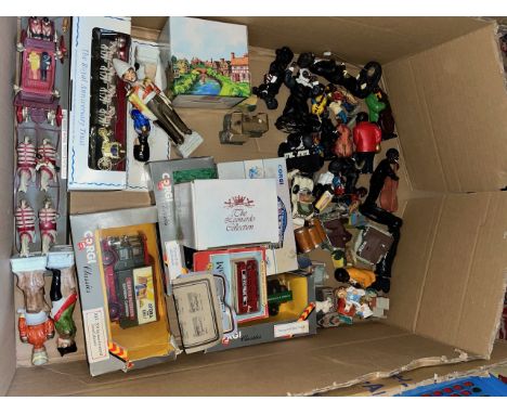 A mixed box including model vehicles such Corgi, Landau 1977, jazz / blues band models, various other models and cottages.  