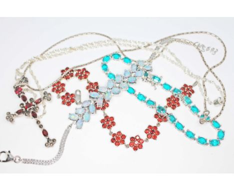 Assorted jewellery comprising an opal triplet bracelet, garnet set jewellery and a blue quartz composite set bracelet, variou