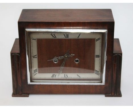 A 1930s mahogany cased mantle clock, length 31cm.  