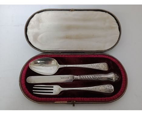 A silver child's cutlery set in associated box, various hallmarks - spoon 1818, fork 1805, knife 1894, gross weight 94.60 gra